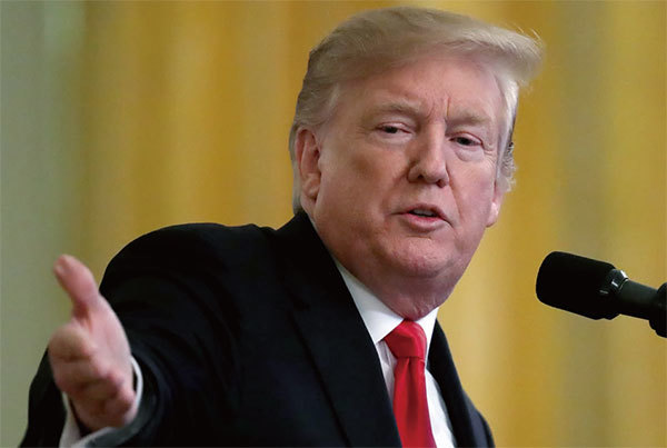 美國總統特朗普表示,他打算公布2016年聯邦調查局依《外國情報監聽法》申請監聽他的競選團隊的手令及相關文件,並將指使者繩之以法。(Getty Images)